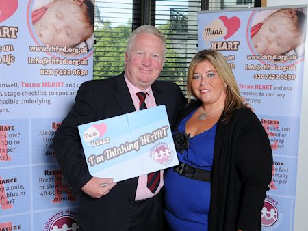 Mike Penning MP with Samantha Johnson, Family Support Manger at the Children’s Heart Federation. (Photo credit: Silver Images)