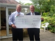 MP presents cheque to Hospice
